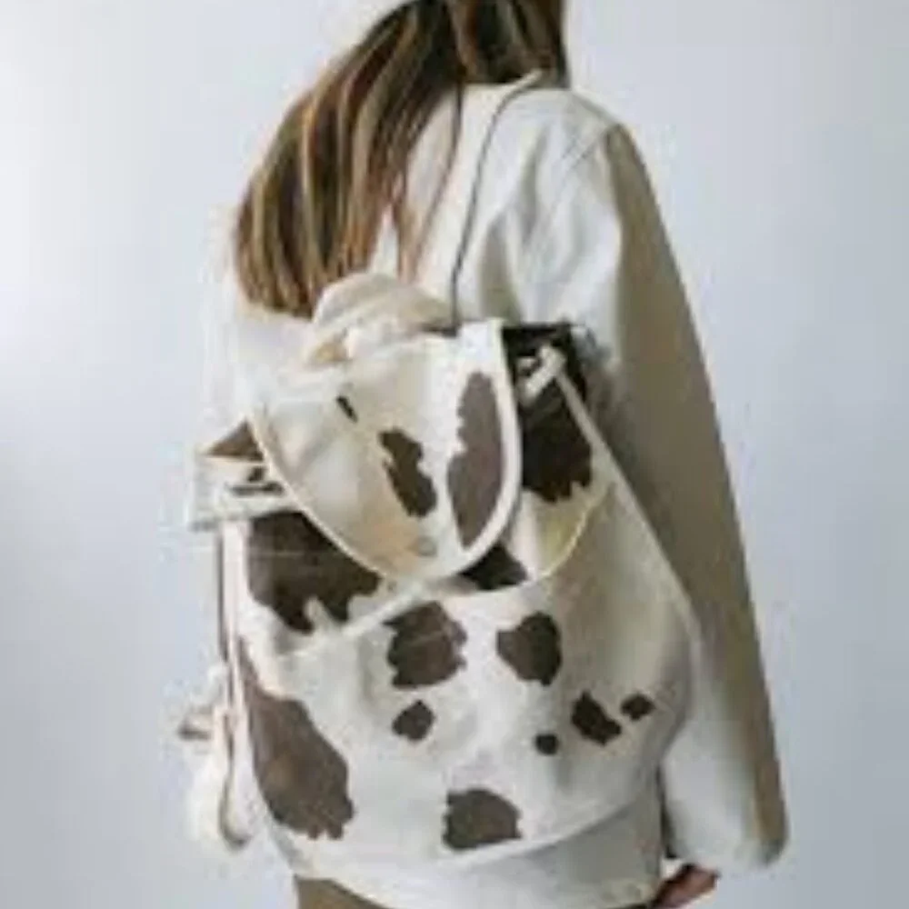 BAGGU Canvas Cow Print Backpack in Cream and Brown